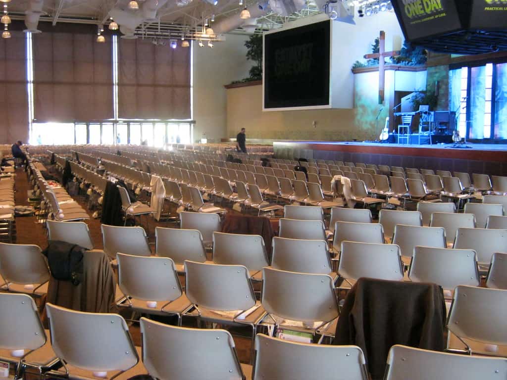 an auditorium with stage as seen from the back